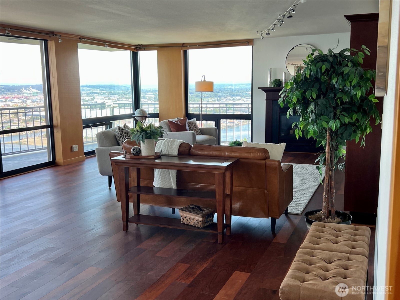 1 North Stadium Way, Unit 16 Tacoma, WA 98403 - Photo 5 of 39 a view of a dining room with furniture window and wooden floor