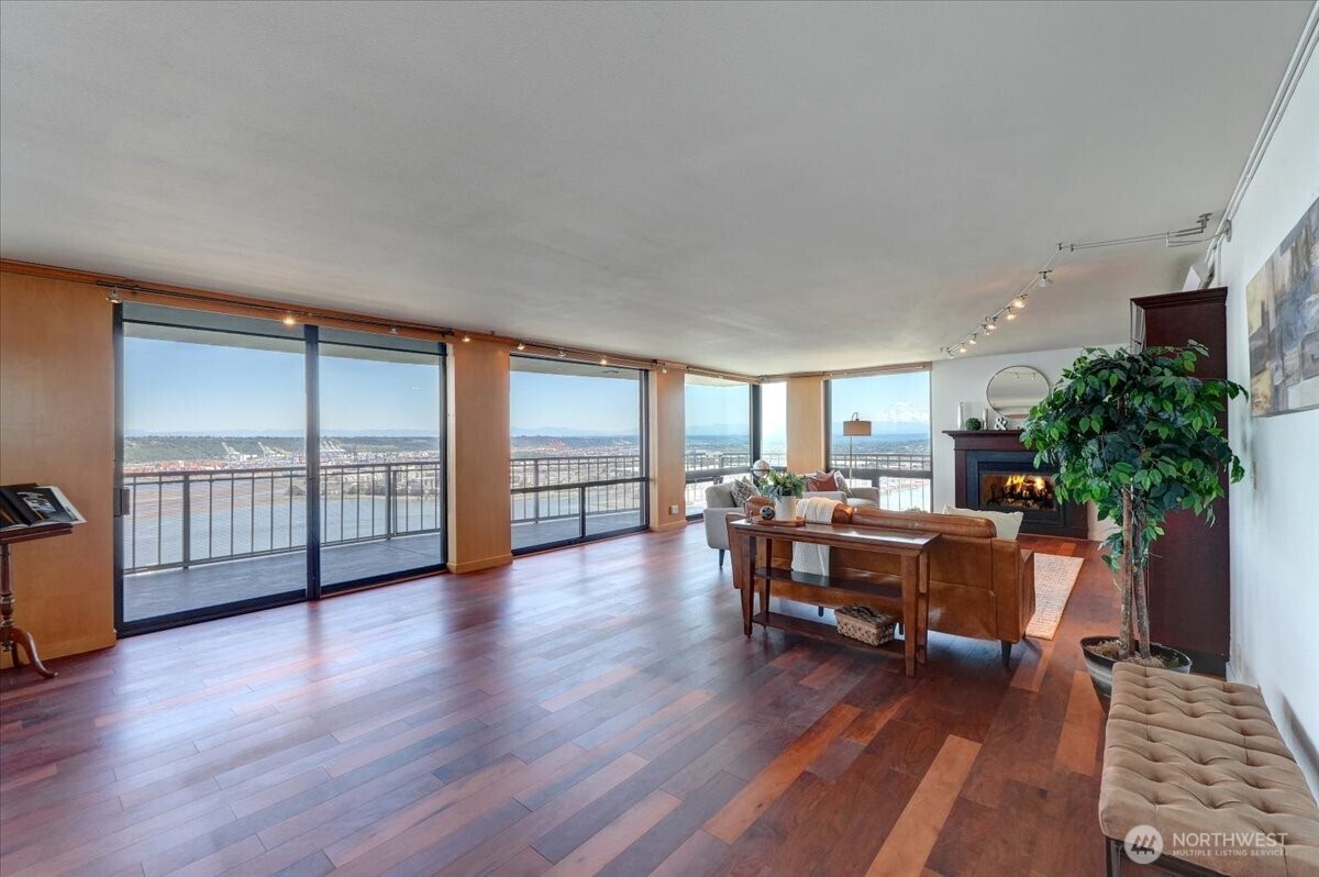 1 North Stadium Way, Unit 16 Tacoma, WA 98403 - Photo 8 of 39 a view of a livingroom with furniture window and wooden floor