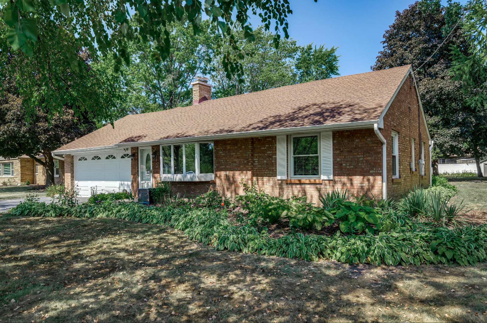 17-w072 Deerpath Road Wood Dale, IL 60191 - Photo 2 of 28 a view of a house with a garden
