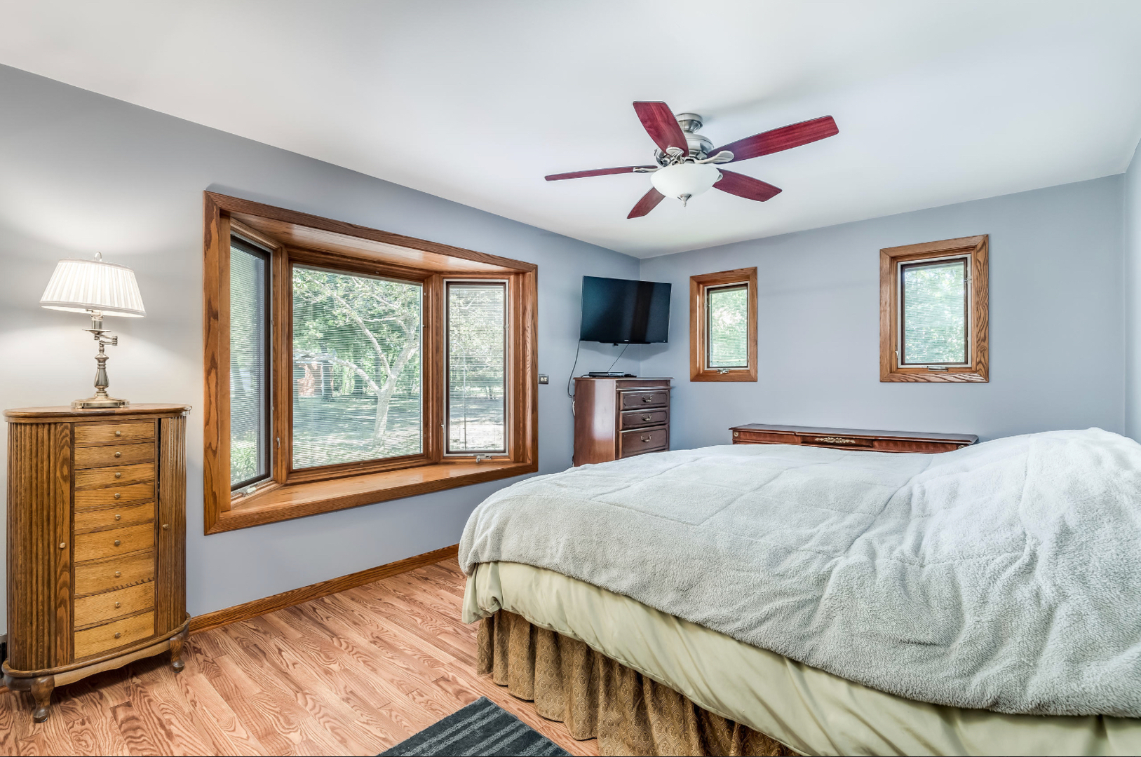 17-w072 Deerpath Road Wood Dale, IL 60191 - Photo 20 of 28 a bedroom with a large bed and a window
