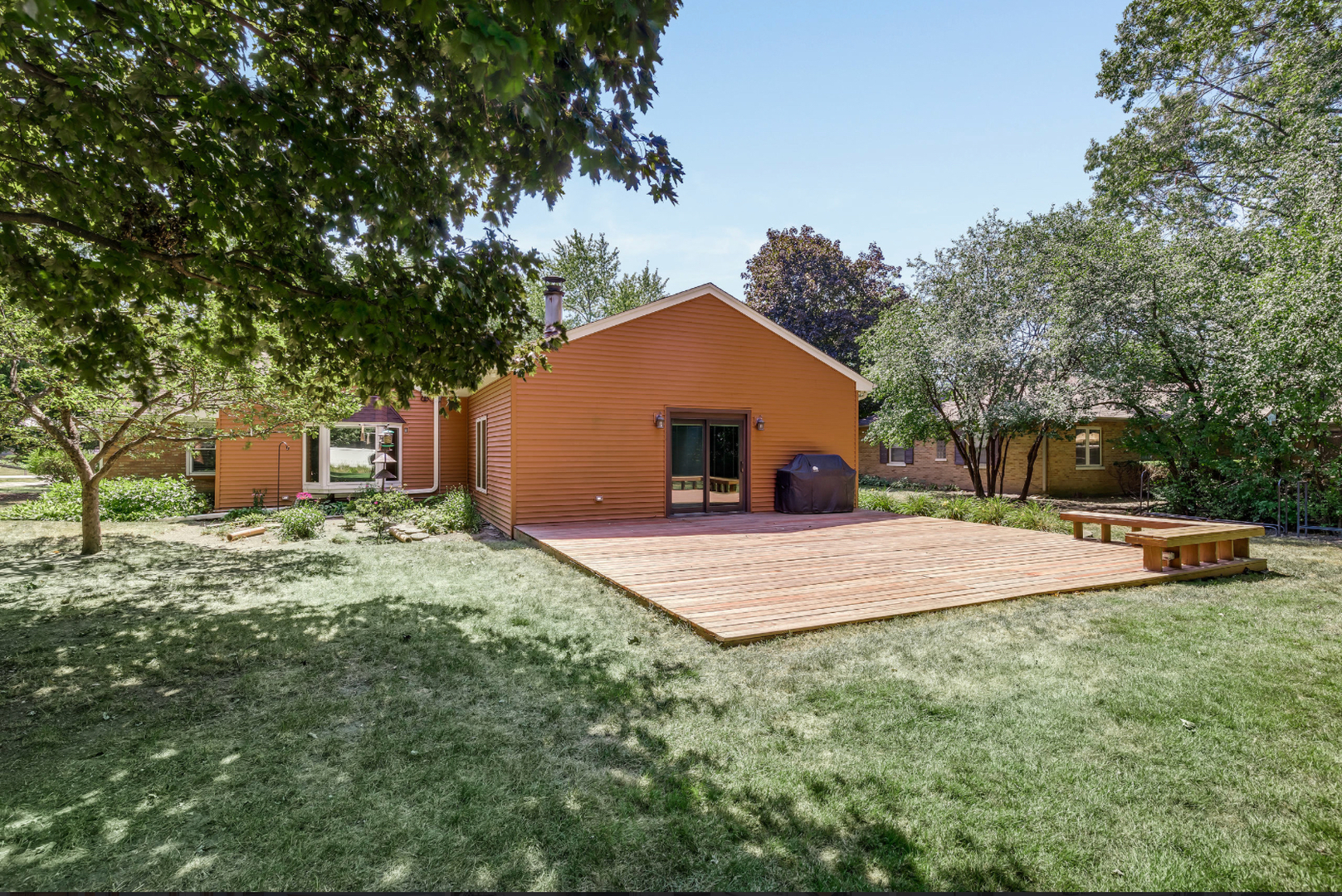 17-w072 Deerpath Road Wood Dale, IL 60191 - Photo 25 of 28 a front view of a house with a yard and tree