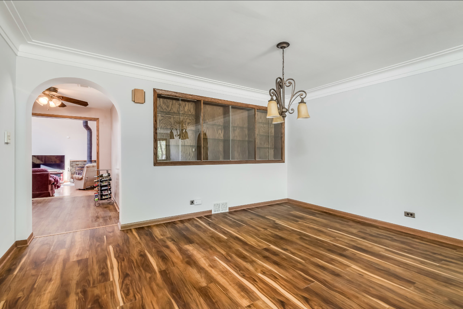 17-w072 Deerpath Road Wood Dale, IL 60191 - Photo 6 of 28 a view of empty room with wooden floor and fan