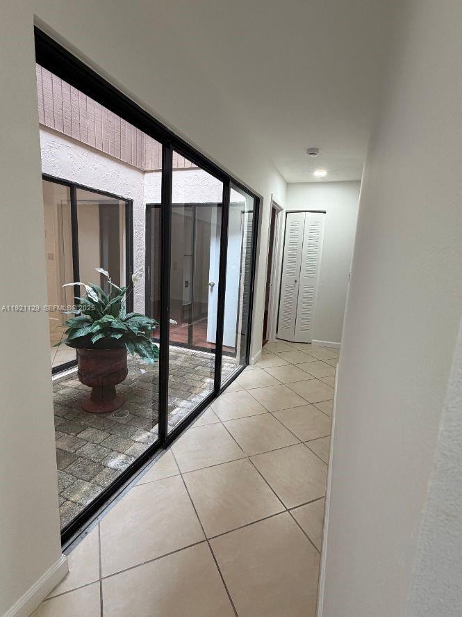 21601 Coronado Avenue Boca Raton, FL 33433 - Photo 5 of 10 a view of a hallway