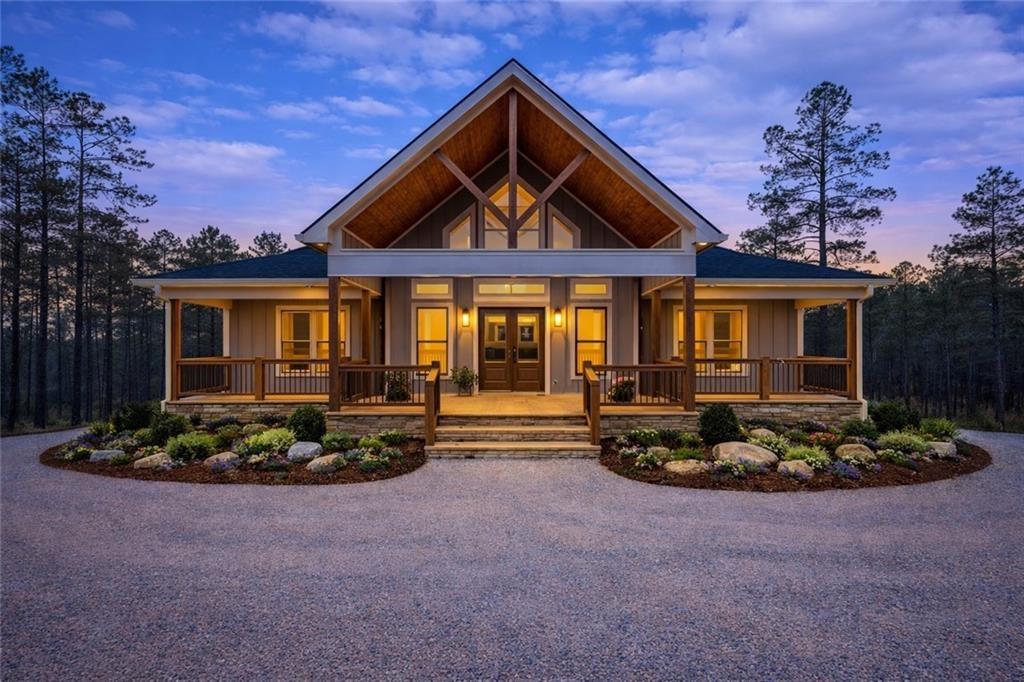 2956 Blalock Mountain Road Talking Rock, GA 30175 - Photo 56 of 63 a front view of a house with a yard