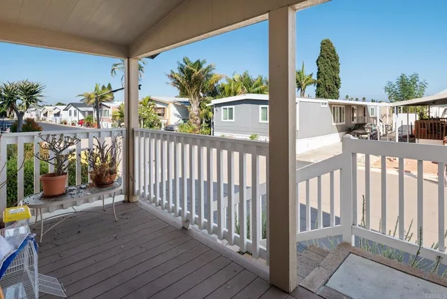 a view of a porch with furniture