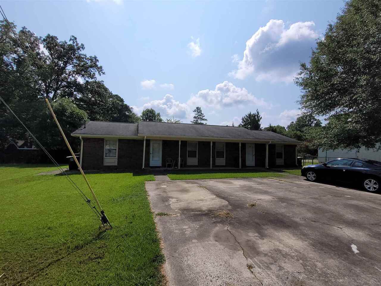 11 Gaddy Drive Southwest Rome, GA 30165 - Photo 1 of 1 a front view of a house with a yard and trees