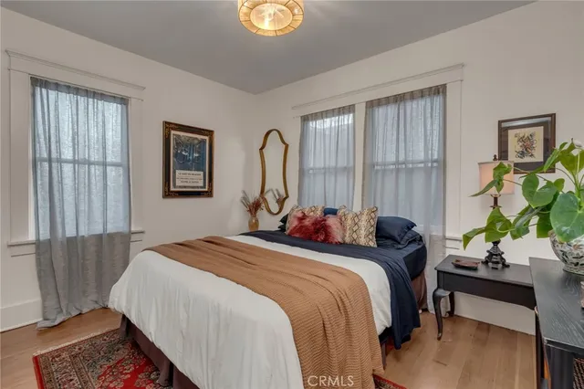 a bed room with a bed and a window