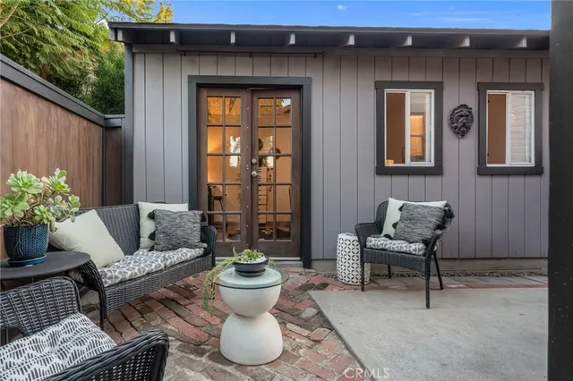 a view of outdoor sitting space with furniture