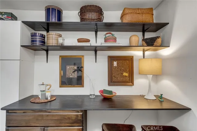 a view of a livingroom with furniture and window