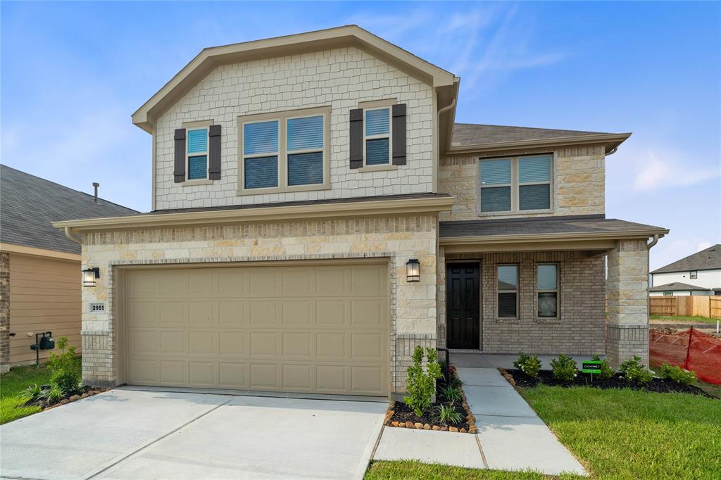 Welcome home to 2955 Elassona Lane located in Olympia Falls and zoned to Fort Bend ISD.