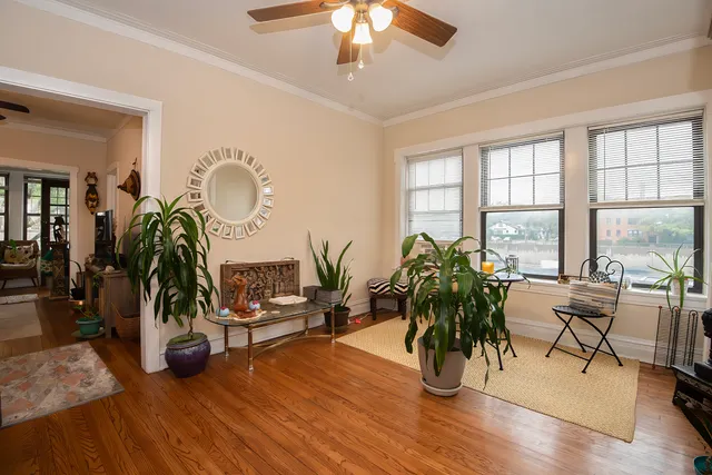 a utility room with cabinets washer and dryer