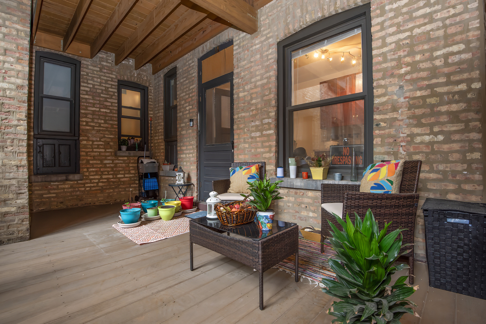 920 Wesley Avenue, Unit 1 Oak Park, IL 60304 - Photo 18 of 21 a living room filled with furniture and a potted plant