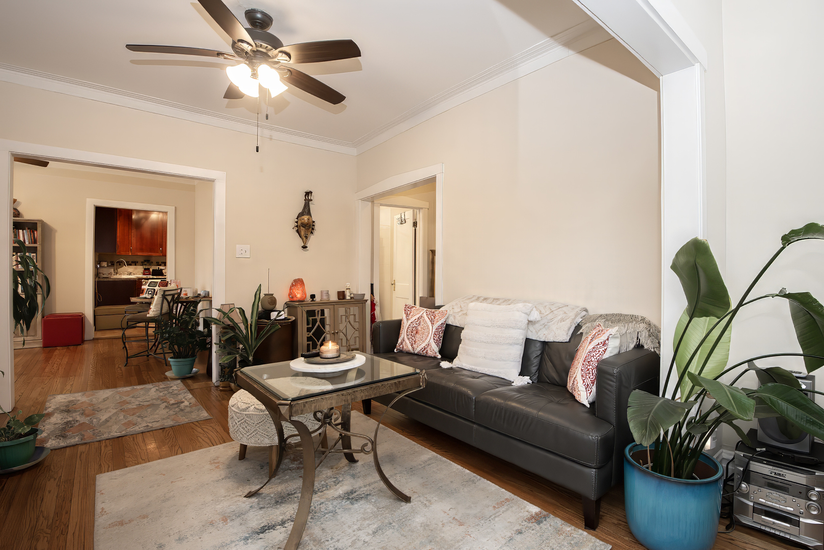 920 Wesley Avenue, Unit 1 Oak Park, IL 60304 - Photo 4 of 21 a living room with furniture potted plant and a window