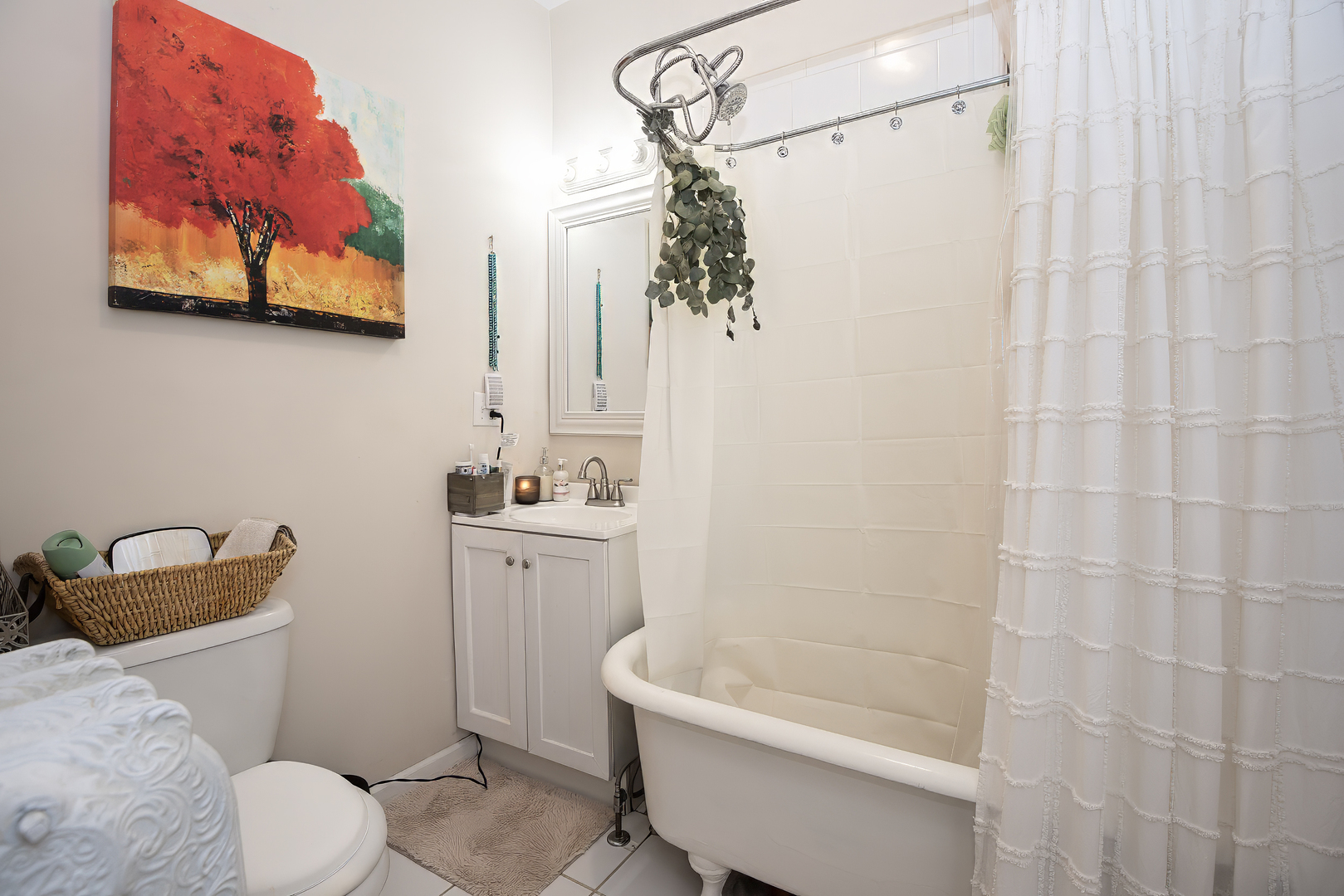 920 Wesley Avenue, Unit 1 Oak Park, IL 60304 - Photo 8 of 21 a bathroom with a sink a toilet and shower