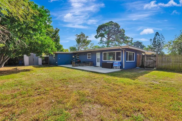 a view of a house with a swimming pool