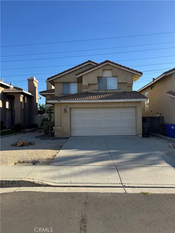 a view of a house with a garage