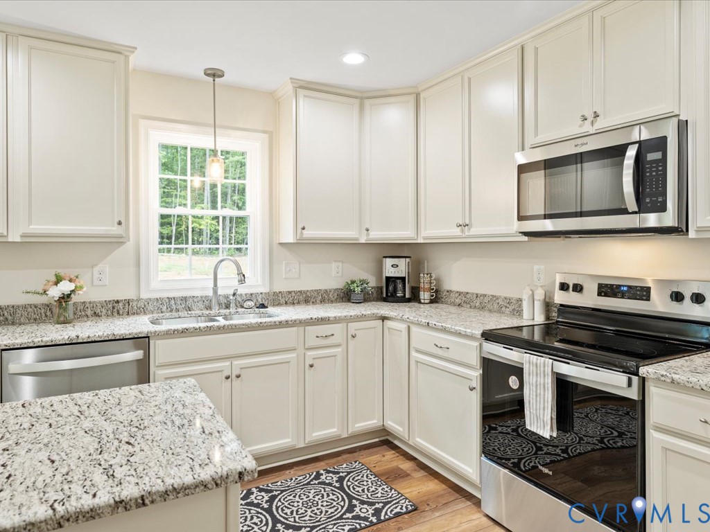 160 Ashburn Road Cumberland, VA 23040 - Photo 17 of 45 a kitchen with a sink stove and microwave