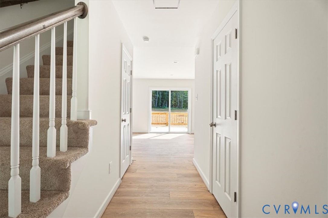 160 Ashburn Road Cumberland, VA 23040 - Photo 20 of 45 a view of a hallway with windows