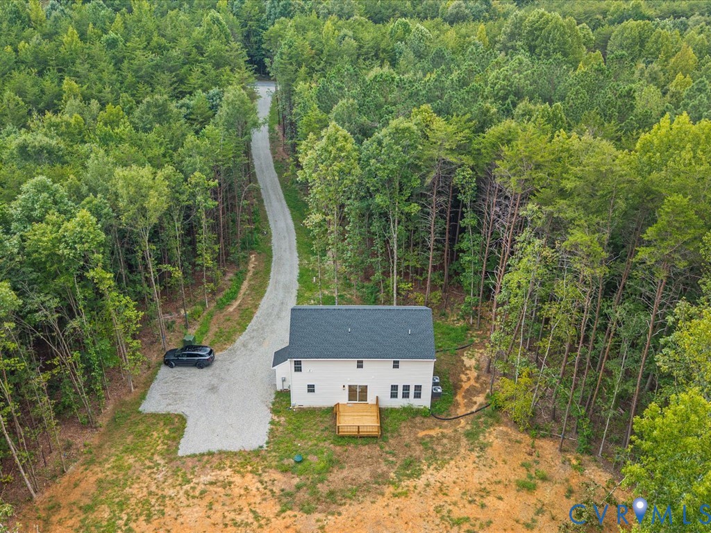 160 Ashburn Road Cumberland, VA 23040 - Photo 2 of 45 a aerial view of a house with swimming pool and trees