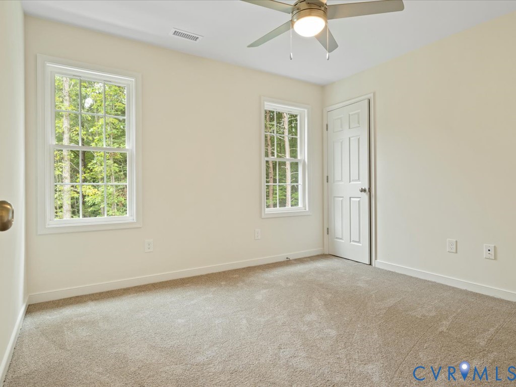 160 Ashburn Road Cumberland, VA 23040 - Photo 38 of 45 an empty room with windows and closet