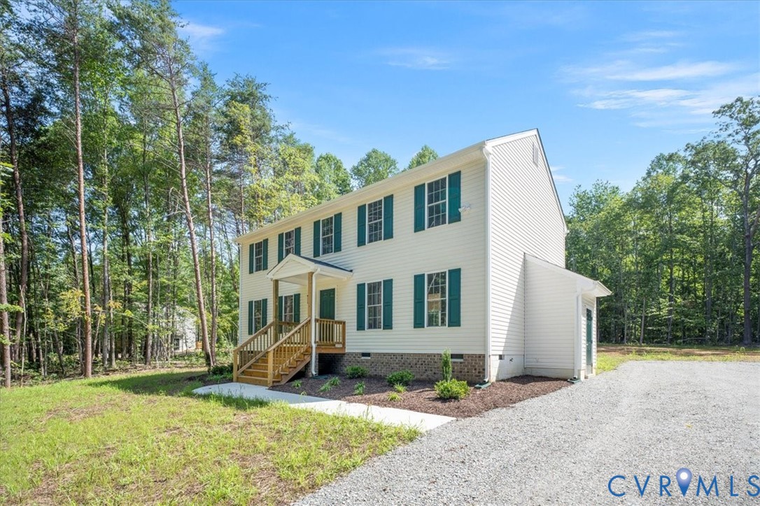 160 Ashburn Road Cumberland, VA 23040 - Photo 4 of 45 front view of a house with a yard