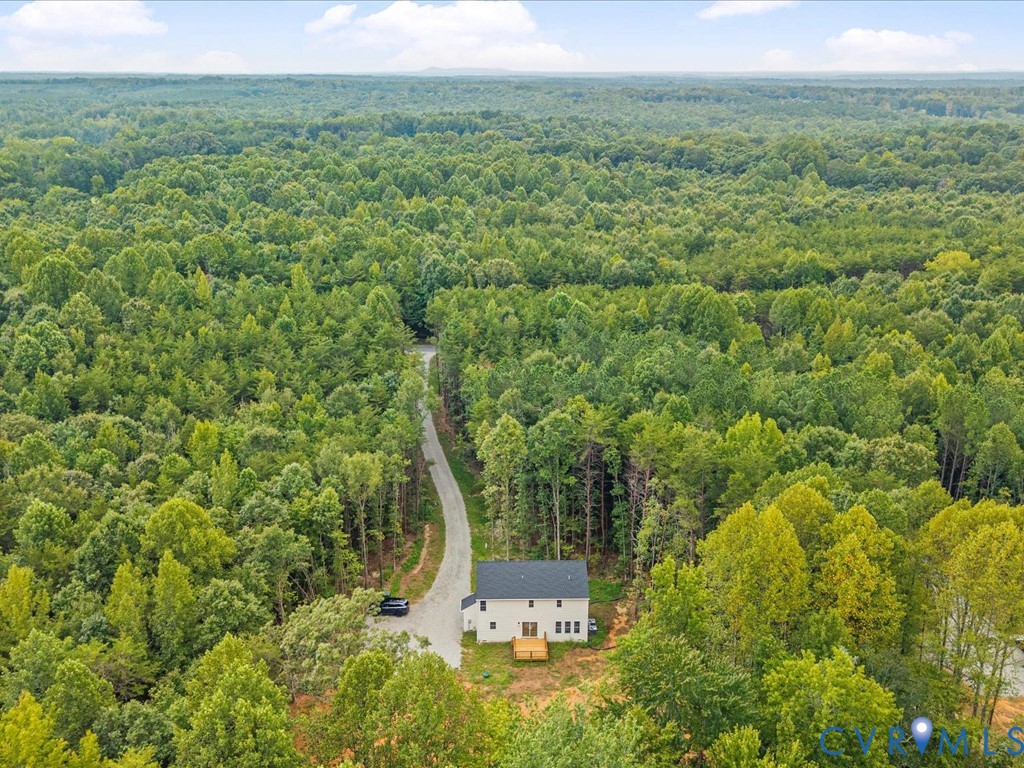 160 Ashburn Road Cumberland, VA 23040 - Photo 44 of 45 a view of a garden with a building in front of it