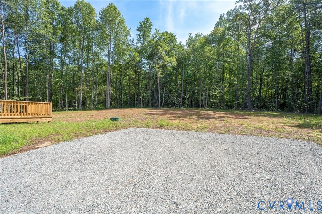 160 Ashburn Road Cumberland, VA 23040 - Photo 7 of 45 a view of a yard with a large trees