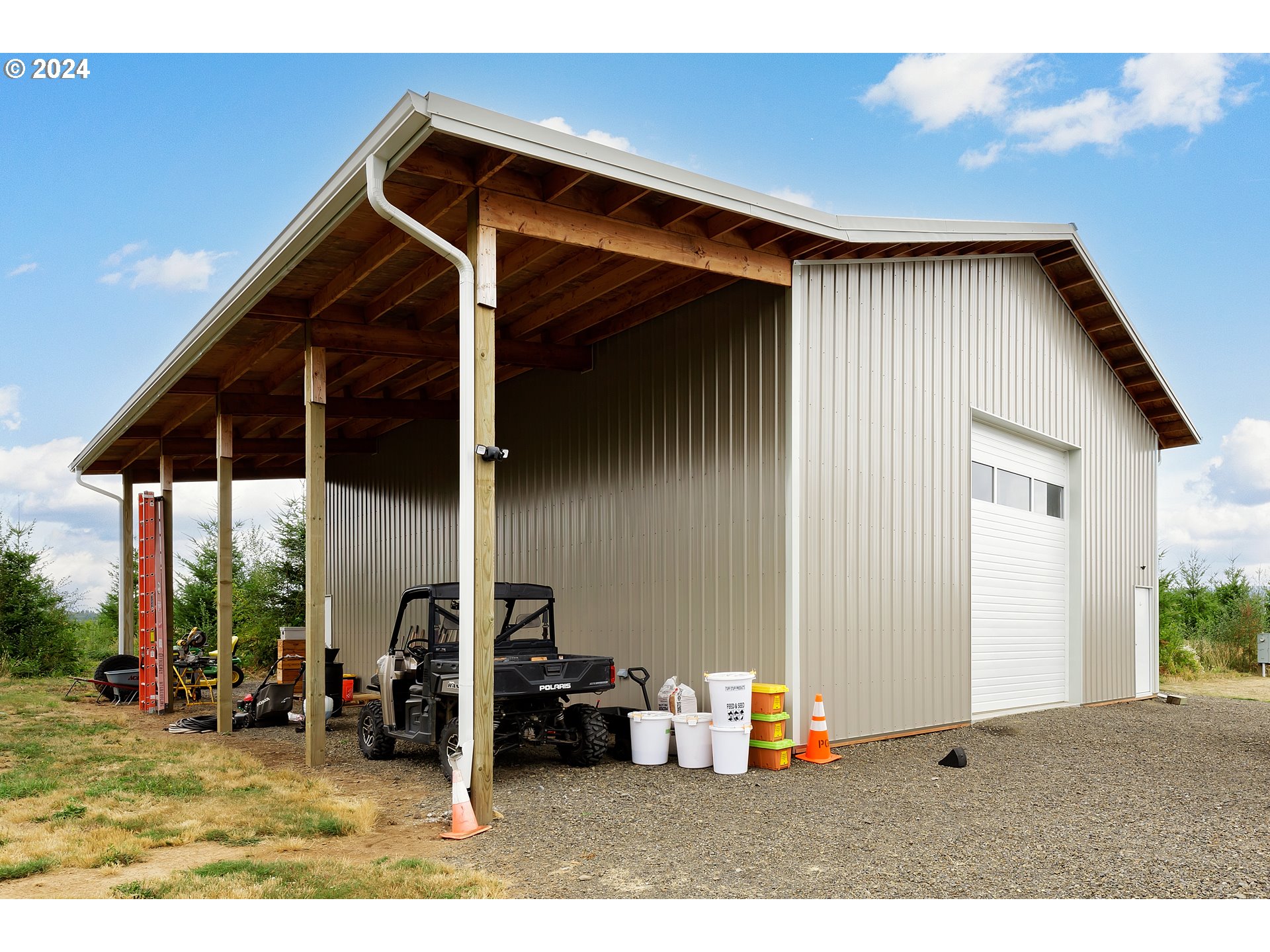 19376 Southeast Chambers Road Sandy, OR 97055 - Photo 38 of 48 a backyard of a house with sofas