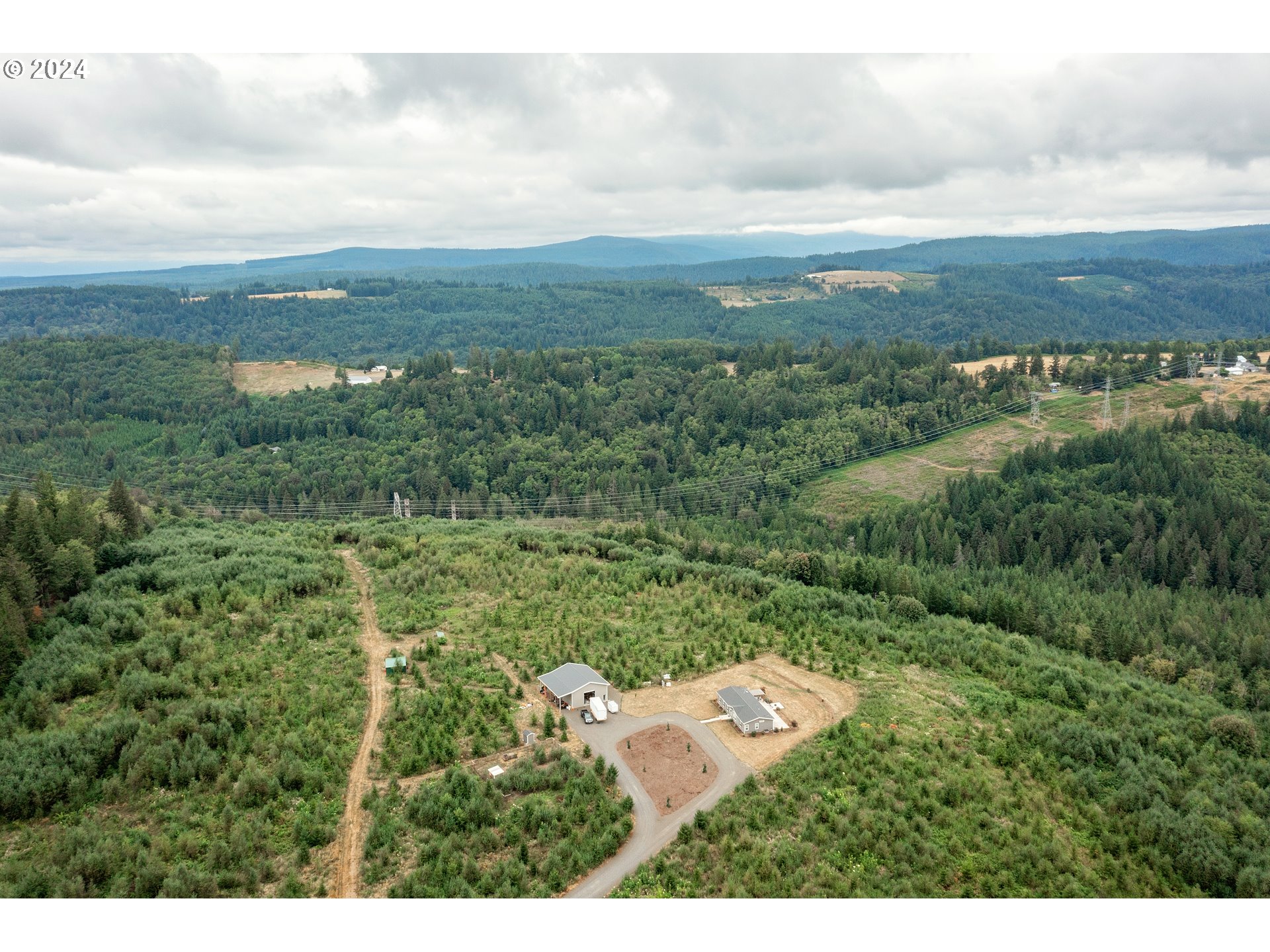19376 Southeast Chambers Road Sandy, OR 97055 - Photo 45 of 48 a view of a city with lush green forest