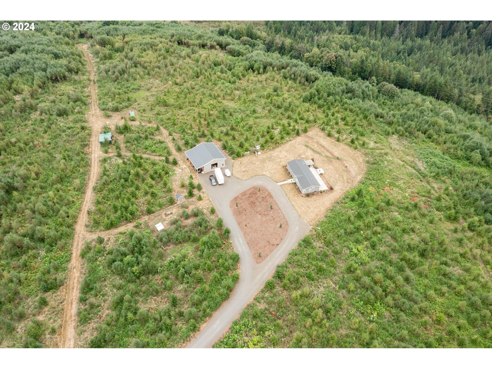 19376 Southeast Chambers Road Sandy, OR 97055 - Photo 46 of 48 a view of a city with lush green forest