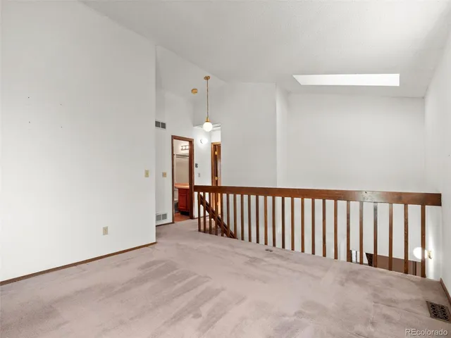 a view of a hallway with entryway