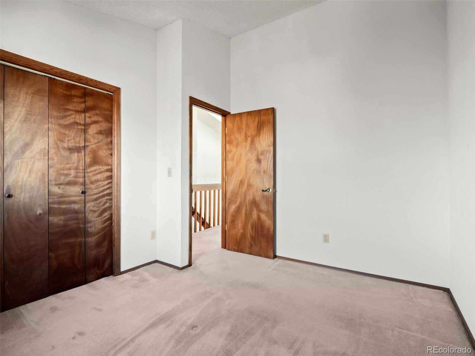 10016 Raritan Way Thornton, CO 80260 - Photo 20 of 43 an empty room with an entryway