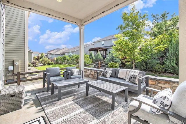 an aerial view of a house with a big yard