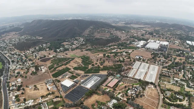 an aerial view of residential house and lake view
