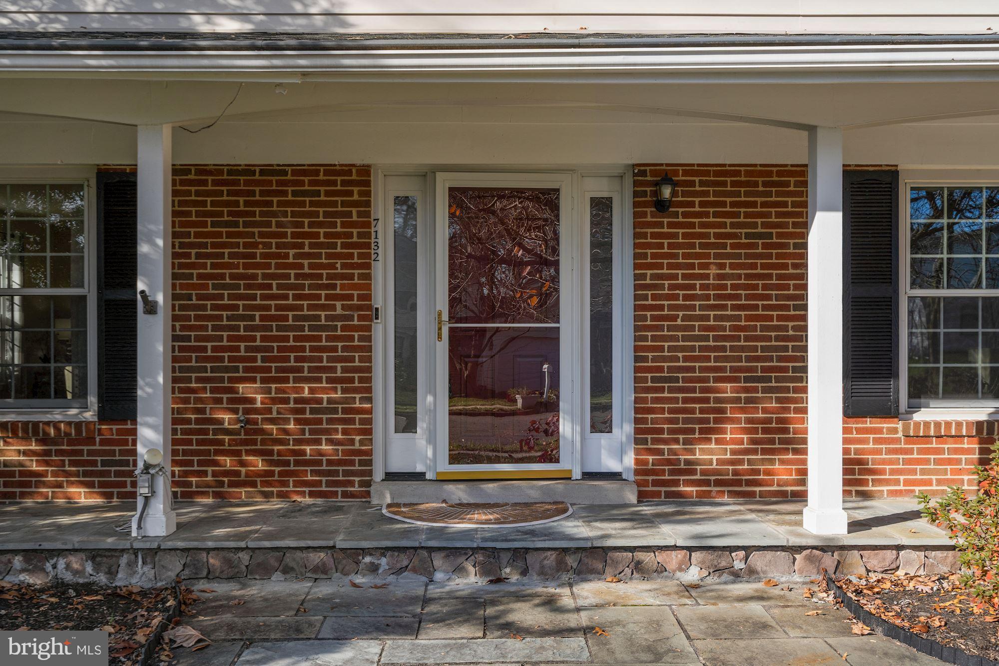 7132 Sontag Way Springfield, VA 22153 - Photo 5 of 53 Flagstone Covered front porch