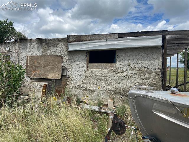 6451 South Johnson Road Rush, CO 80833 - Photo 32 of 46 South side of dilapidated building