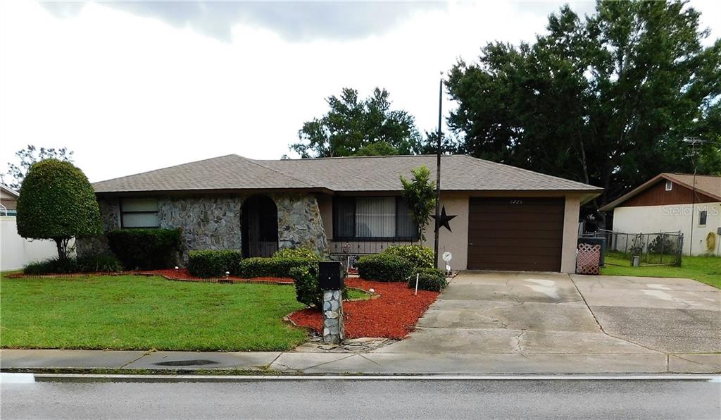 8725 Congress Street Port Richey, FL 34668 - Photo 1 of 1 Great Curb Appeal, Large driveway and sidewalks