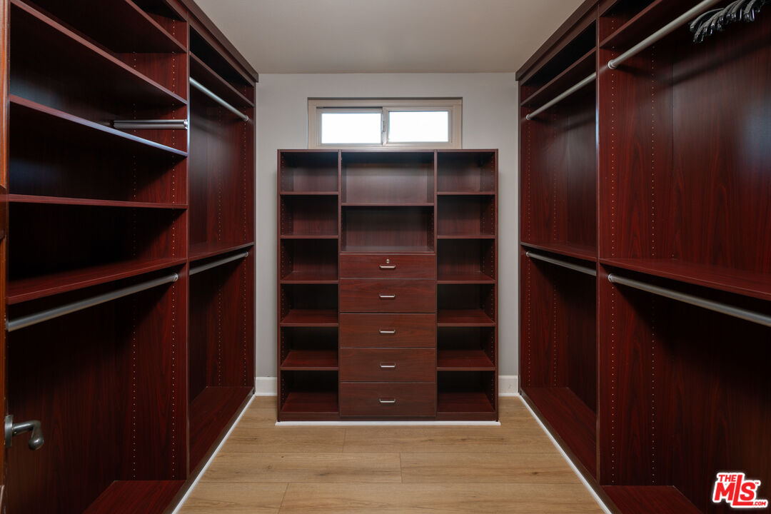 18074 Coastline Drive Malibu, CA 90265 - Photo 23 of 33 a view of walk in closet with empty racks