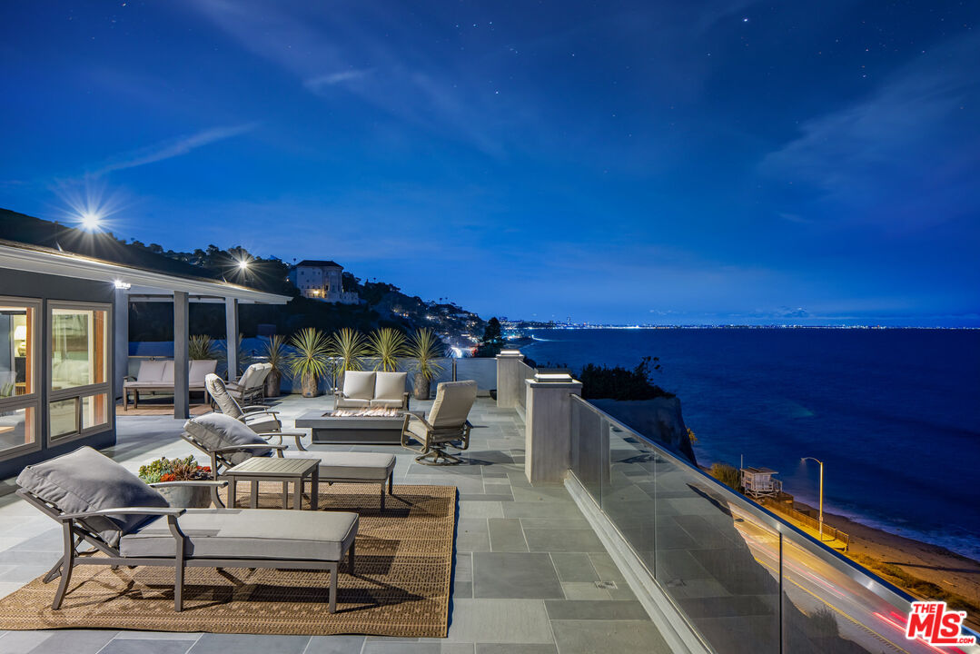 18074 Coastline Drive Malibu, CA 90265 - Photo 31 of 33 a view of a terrace with furniture