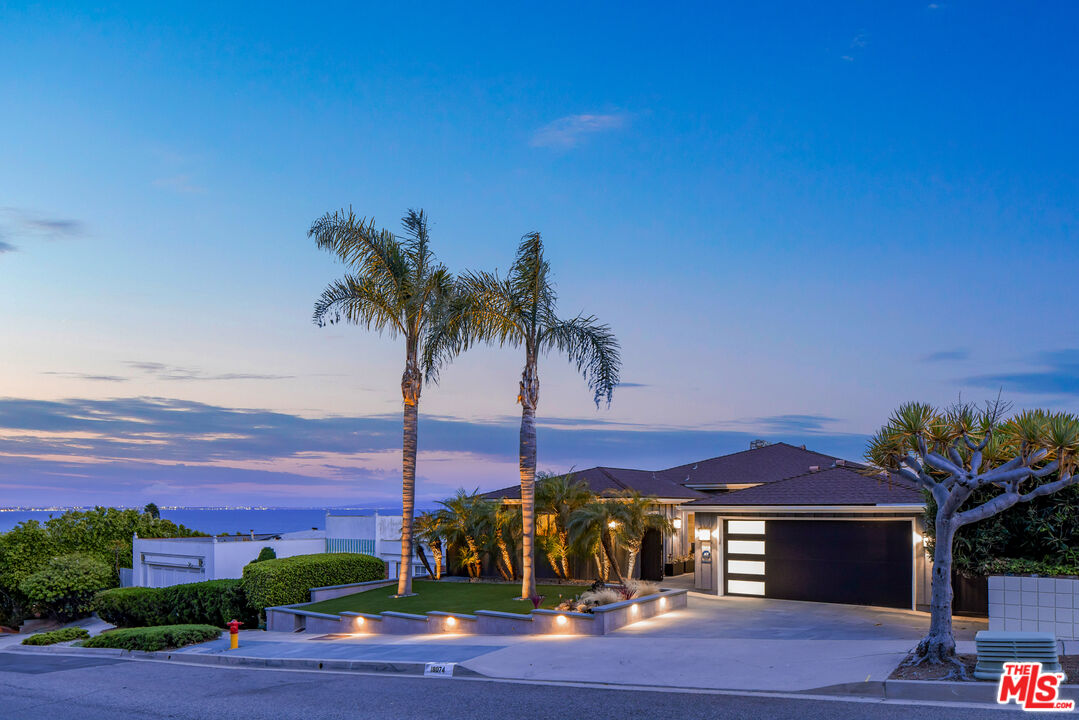 18074 Coastline Drive Malibu, CA 90265 - Photo 33 of 33 a view of a house with a swimming pool