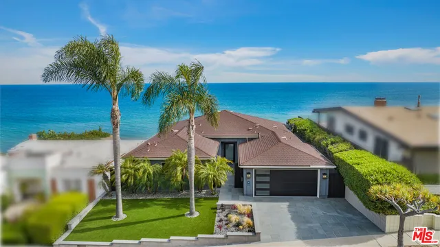 a view of a house with a swimming pool