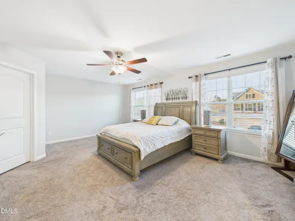 a kitchen with stainless steel appliances a refrigerator sink and microwave