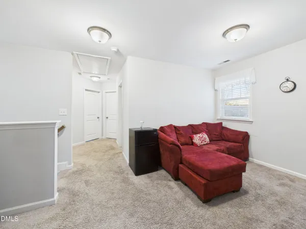 a kitchen with stainless steel appliances granite countertop a refrigerator stove and sink