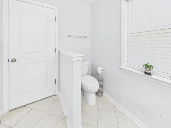 a bathroom with a granite countertop sink mirror and
