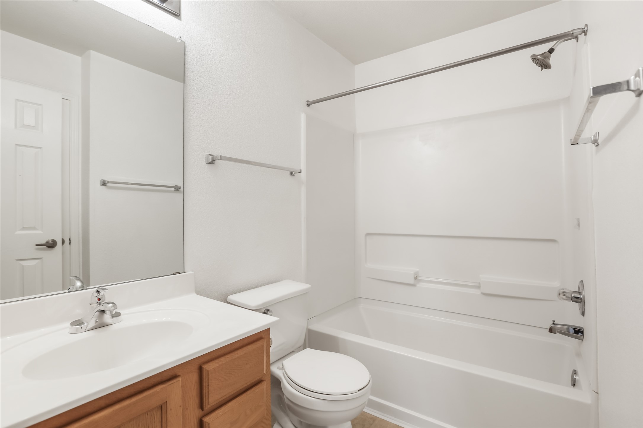 2010 Ashberry Trail Georgetown, TX 78626 - Photo 12 of 24 Bathroom with vanity and tub / shower combination