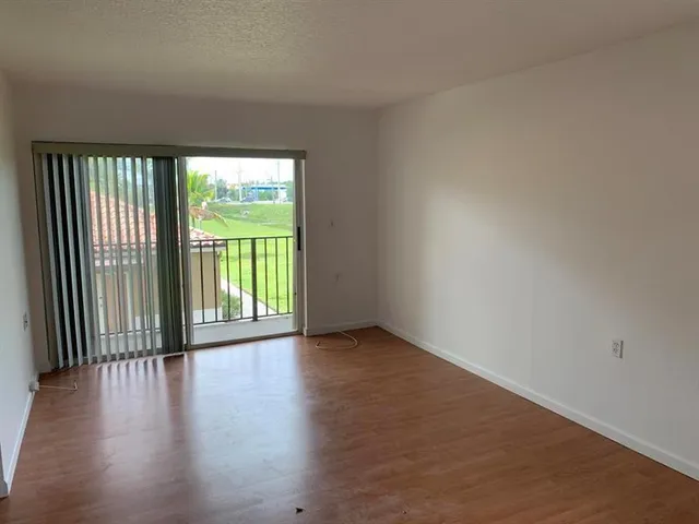 $1,500 | 1089 Benoist Farms Road, Unit 202, West Palm Beach, FL 33411