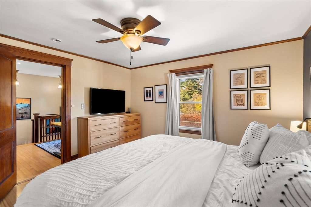 11 Pickman Road Salem, MA 01970 - Photo 18 of 40 a bedroom with a bed and a flat screen tv
