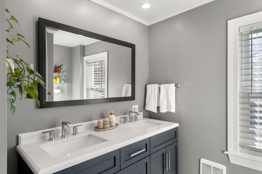 11 Pickman Road Salem, MA 01970 - Photo 21 of 40 a bathroom with a sink and a mirror