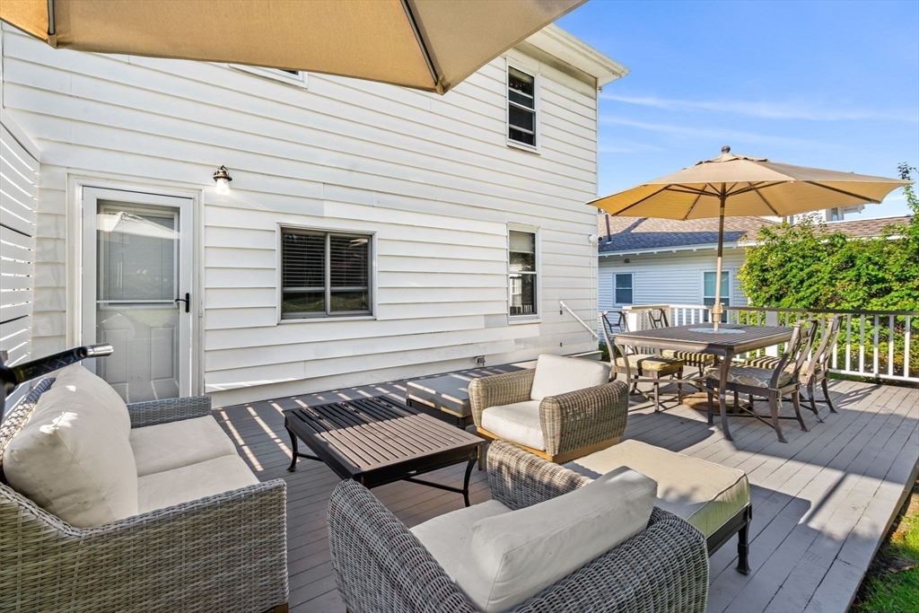 11 Pickman Road Salem, MA 01970 - Photo 31 of 40 a backyard of a house with outdoor seating