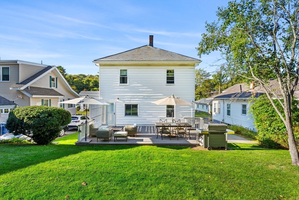 11 Pickman Road Salem, MA 01970 - Photo 32 of 40 a front view of house with yard and outdoor seating